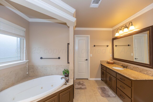 7414 Southbend Dr, Amarillo, TX 79119 - full bathroom featuring a whirlpool tub, vanity, ornamental molding, and tile patterned floors