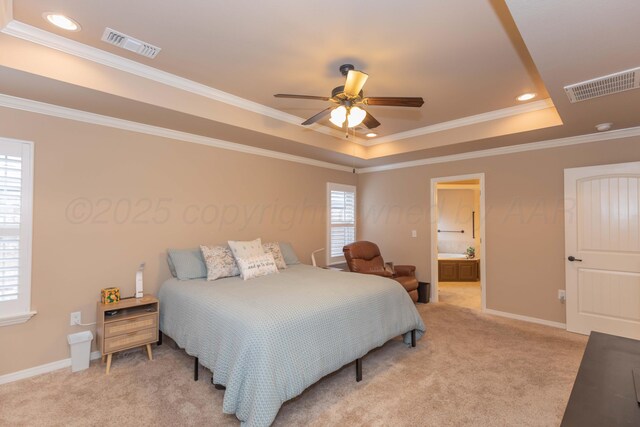 7414 Southbend Dr, Amarillo, TX 79119 - bedroom with light colored carpet, a raised ceiling, crown molding, recessed lighting, and ensuite bathroom