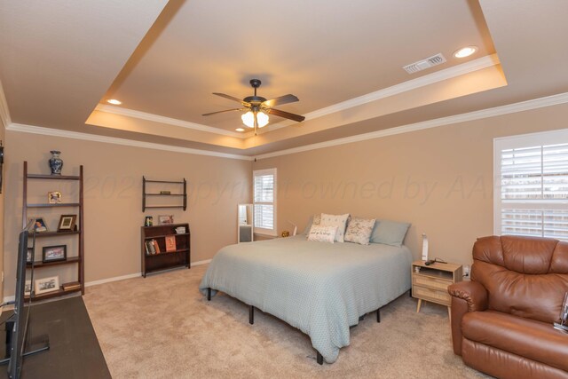 7414 Southbend Dr, Amarillo, TX 79119 - bedroom with a tray ceiling, light colored carpet, ornamental molding, recessed lighting, and ceiling fan