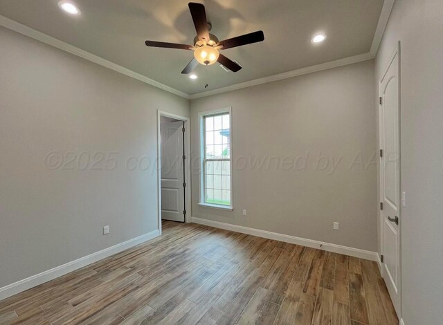 7504 Limestone Dr, Amarillo, TX 79119 - unfurnished room with ceiling fan, wood finished floors, baseboards, crown molding, and recessed lighting