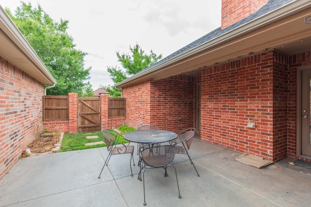 7901 Kingsgate Dr, Amarillo, TX 79119 - view of patio with a gate and outdoor dining space