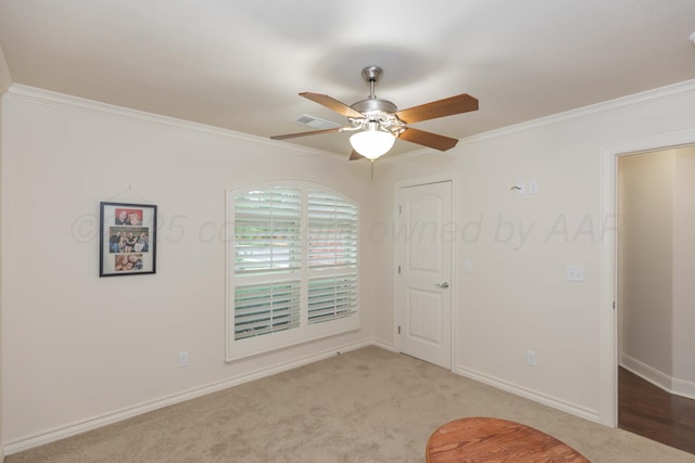 7901 Kingsgate Dr, Amarillo, TX 79119 - unfurnished bedroom featuring ornamental molding, carpet, and a ceiling fan