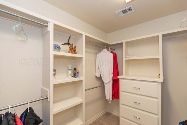 7901 Kingsgate Dr, Amarillo, TX 79119 - spacious closet featuring carpet flooring