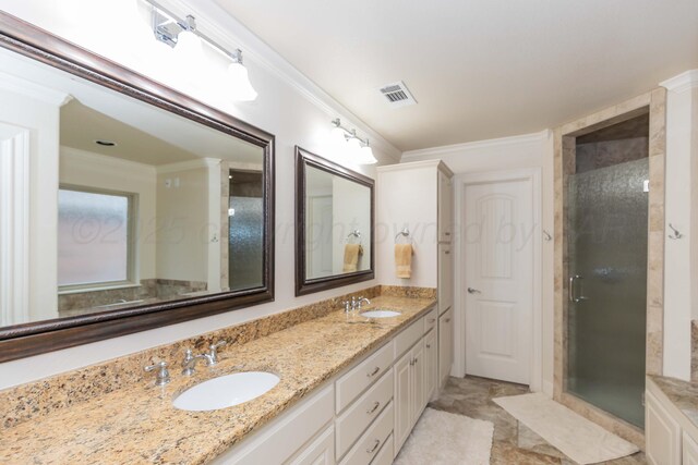 7901 Kingsgate Dr, Amarillo, TX 79119 - bathroom with double vanity, crown molding, and a stall shower