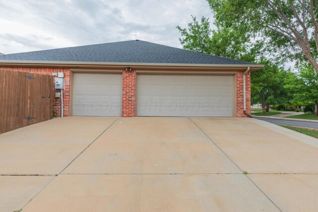 7901 Kingsgate Dr, Amarillo, TX 79119 - garage featuring concrete driveway