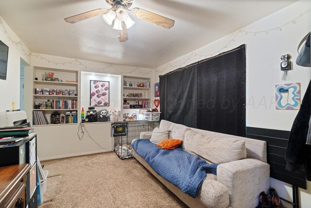 4621 Crockett St, Amarillo, TX 79110 - living area featuring carpet, a ceiling fan, and built in shelves