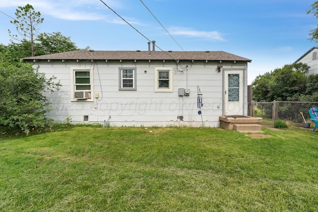 4621 Crockett St, Amarillo, TX 79110 - rear view of property featuring cooling unit and a shingled roof