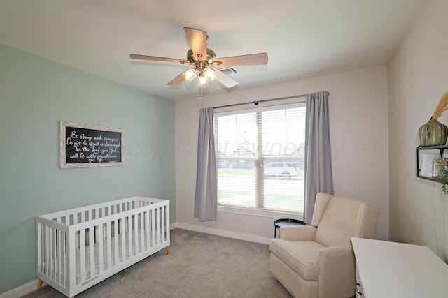 6107 Bowery, Amarillo, TX 79119 - bedroom featuring a nursery area, baseboards, a ceiling fan, and carpet flooring