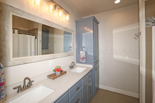 6107 Bowery, Amarillo, TX 79119 - full bathroom with double vanity, recessed lighting, and baseboards