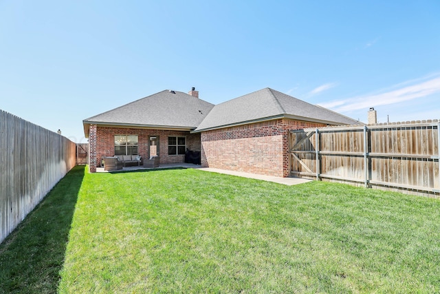6107 Bowery, Amarillo, TX 79119 - back of house with brick siding, outdoor lounge area, and a shingled roof