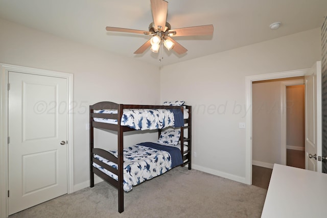 6107 Bowery, Amarillo, TX 79119 - bedroom featuring light carpet, baseboards, and ceiling fan