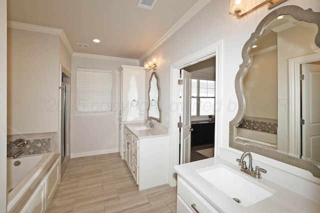 6107 Bowery, Amarillo, TX 79119 - full bath featuring two vanities, a garden tub, crown molding, wood finished floors, and recessed lighting
