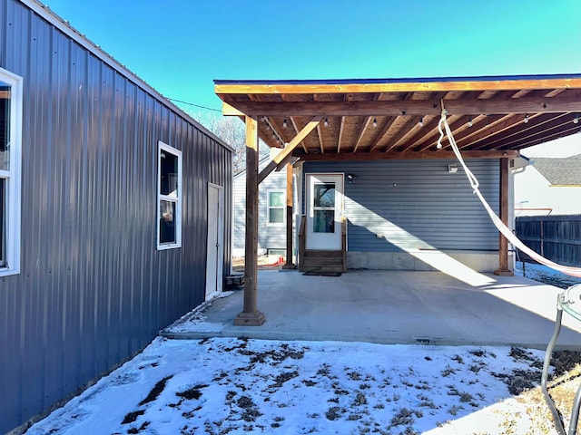 view of snow covered patio