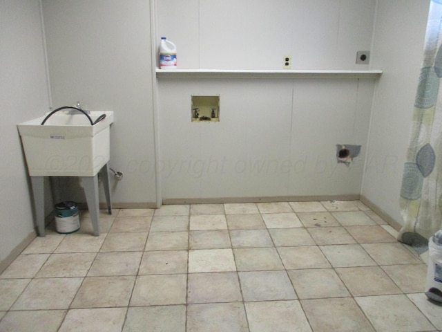 laundry room with baseboards, hookup for an electric dryer, laundry area, and hookup for a washing machine