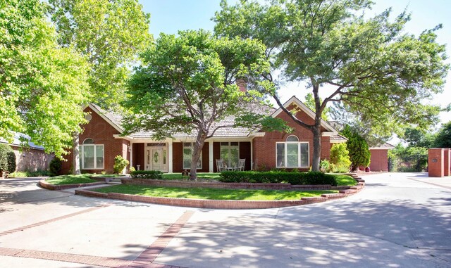 18 Cloister Pkwy, Amarillo, TX 79121 - view of front of home with brick siding