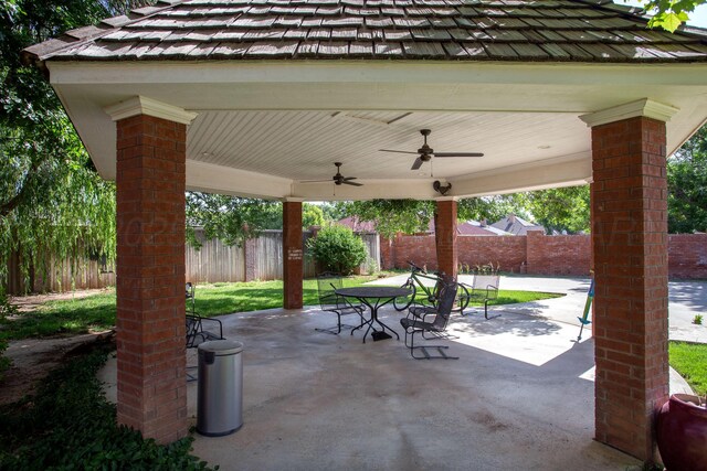 18 Cloister Pkwy, Amarillo, TX 79121 - fenced backyard featuring ceiling fan, outdoor dining area, and a patio
