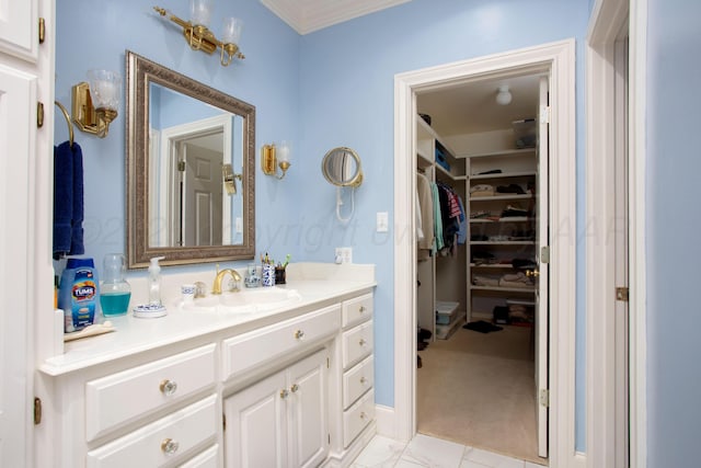 18 Cloister Pkwy, Amarillo, TX 79121 - bathroom with vanity, a spacious closet, and crown molding