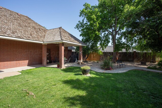 18 Cloister Pkwy, Amarillo, TX 79121 - fenced backyard featuring a patio