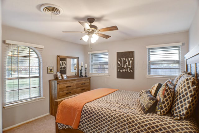 bedroom featuring ceiling fan and carpet flooring