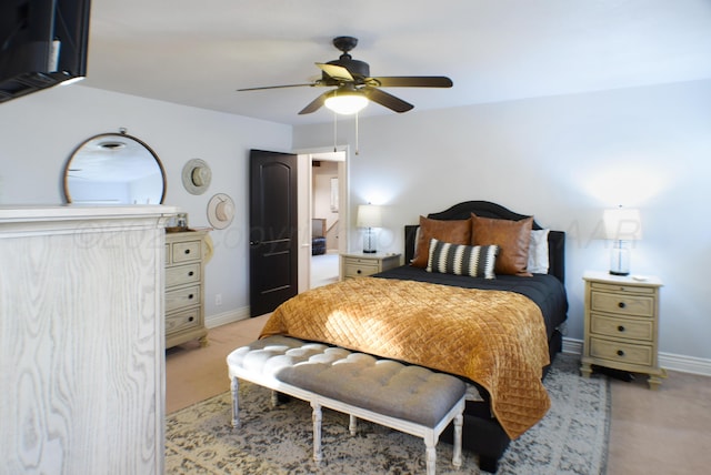 bedroom with light carpet and ceiling fan