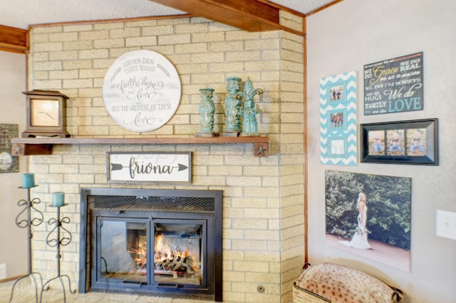 details with a fireplace and beamed ceiling