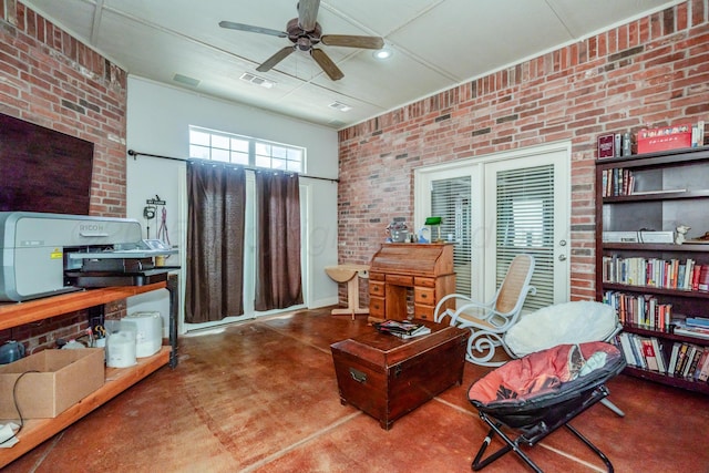 6903 Silverbell Ln, Amarillo, TX 79124 - living area featuring brick wall, a ceiling fan, and concrete flooring