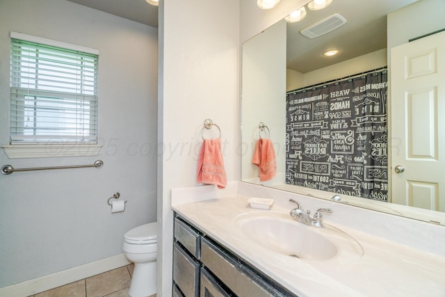 6903 Silverbell Ln, Amarillo, TX 79124 - full bath featuring tile patterned flooring, vanity, toilet, and baseboards