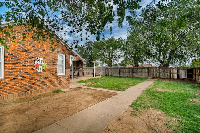 view of yard with a patio area