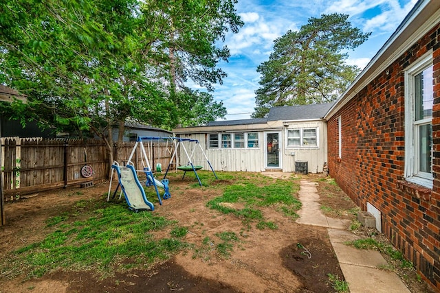 view of yard with a playground