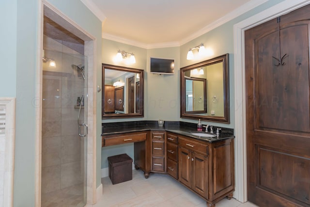 bathroom featuring ornamental molding, tile patterned flooring, vanity, and a shower with shower door