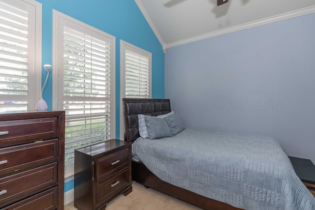 bedroom with light colored carpet, ceiling fan, crown molding, and vaulted ceiling