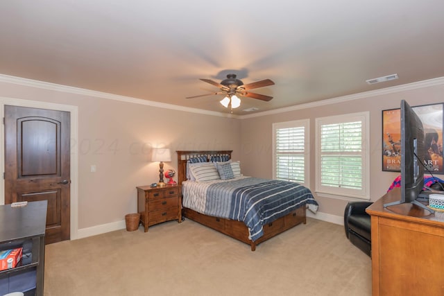 bedroom featuring light carpet, ceiling fan, and crown molding