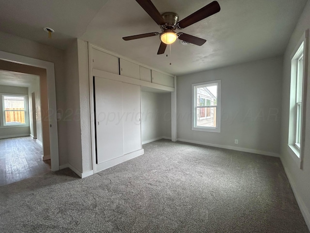 1223 Keeler Ave, Dalhart, TX 79022 - unfurnished bedroom featuring carpet flooring, baseboards, and a closet