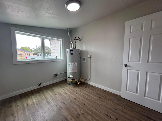 1223 Keeler Ave, Dalhart, TX 79022 - utility room featuring water heater