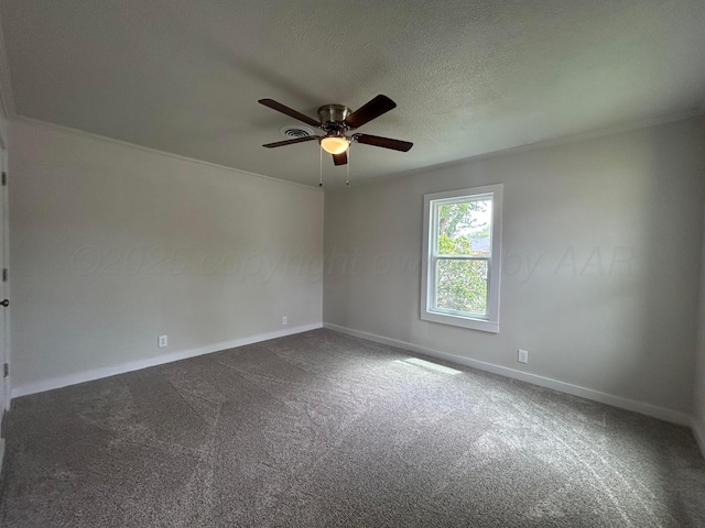 1223 Keeler Ave, Dalhart, TX 79022 - spare room featuring baseboards, a ceiling fan, dark carpet, and a textured ceiling