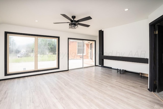 1802 Chama St, Amarillo, TX 79102 - unfurnished room featuring light wood-style flooring, ceiling fan, and recessed lighting