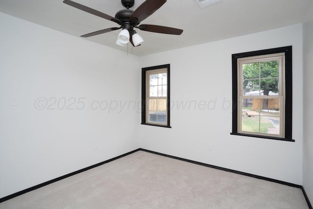 1802 Chama St, Amarillo, TX 79102 - spare room with carpet, plenty of natural light, and ceiling fan