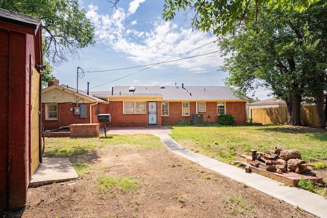 1802 Chama St, Amarillo, TX 79102 - back of house with a patio area and brick siding