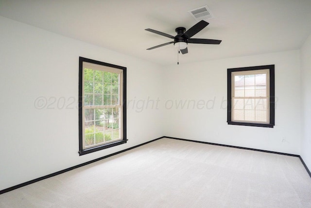 1802 Chama St, Amarillo, TX 79102 - carpeted spare room with a ceiling fan and baseboards