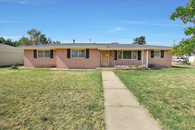 709 Franklin Ave, Panhandle, TX 79068 - single story home with brick siding and a front yard