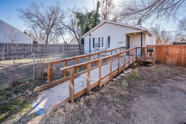 exterior space featuring a fenced backyard