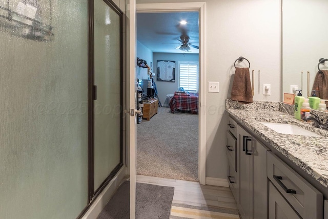 5904 Nancy Ellen St, Amarillo, TX 79119 - ensuite bathroom with vanity, a stall shower, and ceiling fan