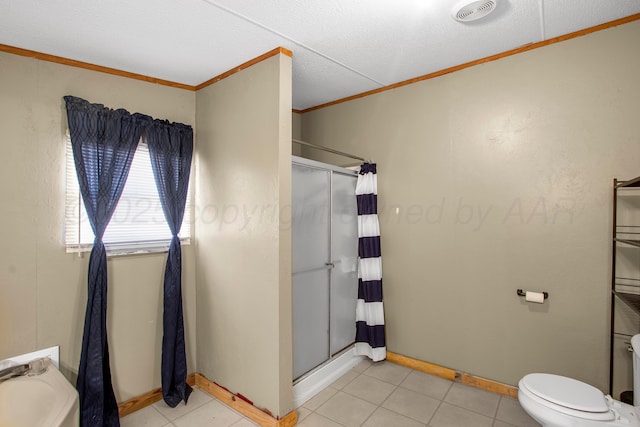 bathroom with tile patterned floors, curtained shower, toilet, and crown molding