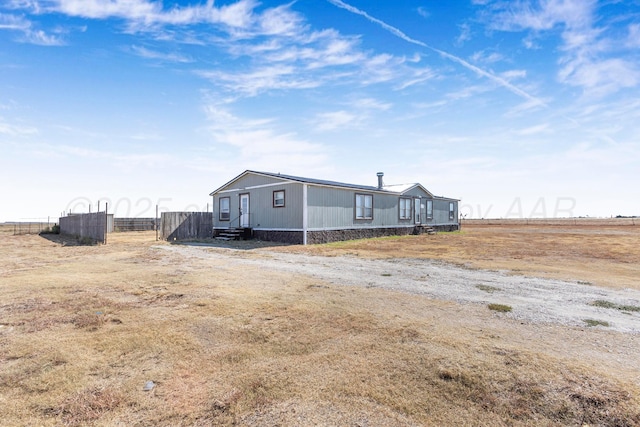 exterior space featuring a rural view