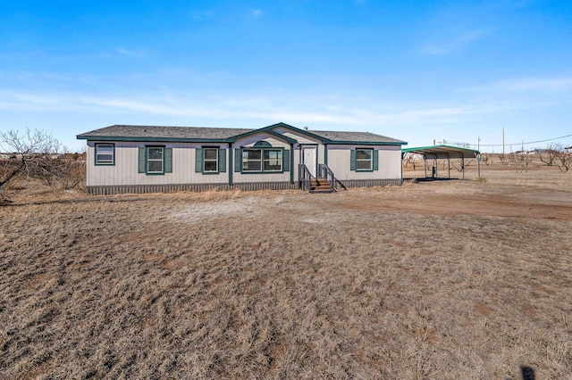 7401 Sabre Trl, Amarillo, TX 79124 - manufactured / mobile home with a carport and entry steps