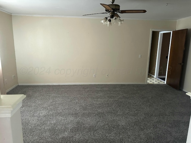 carpeted empty room featuring ceiling fan and crown molding