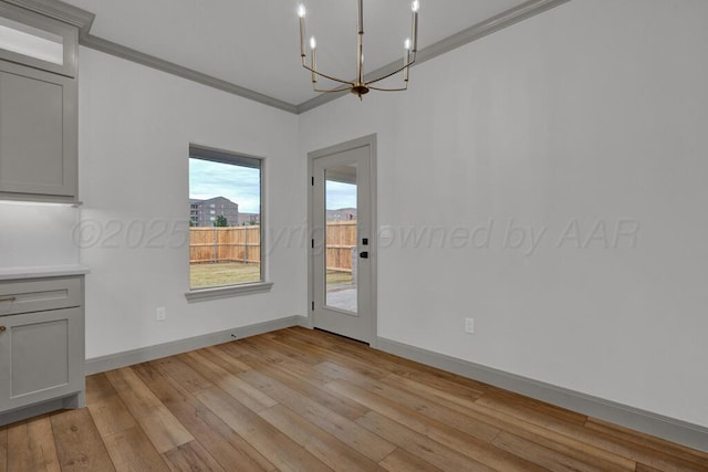 5505 Sheridan St, Amarillo, TX 79119 - unfurnished room with a chandelier and light wood finished floors