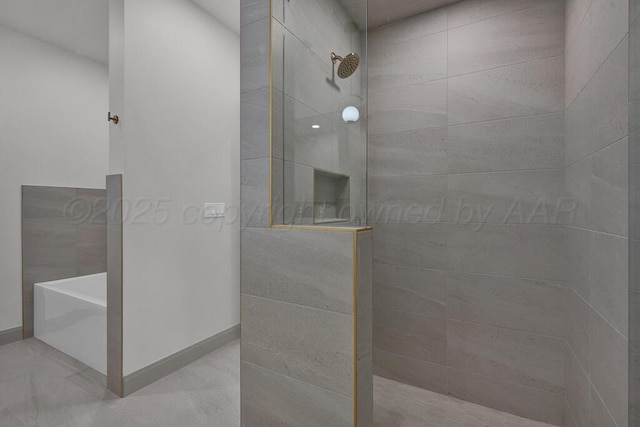 5505 Sheridan St, Amarillo, TX 79119 - bathroom featuring walk in shower, a garden tub, and tile patterned floors
