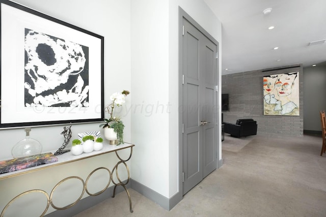 1600 S Milam St, Amarillo, TX 79102 - hall featuring concrete flooring, baseboards, and recessed lighting
