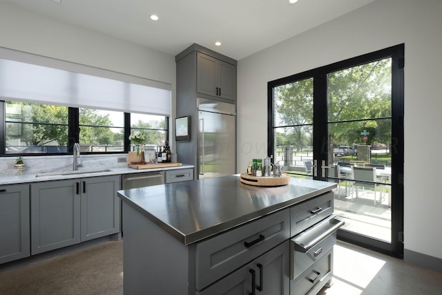 1600 S Milam St, Amarillo, TX 79102 - kitchen with gray cabinets, a sink, stainless steel appliances, a warming drawer, and recessed lighting